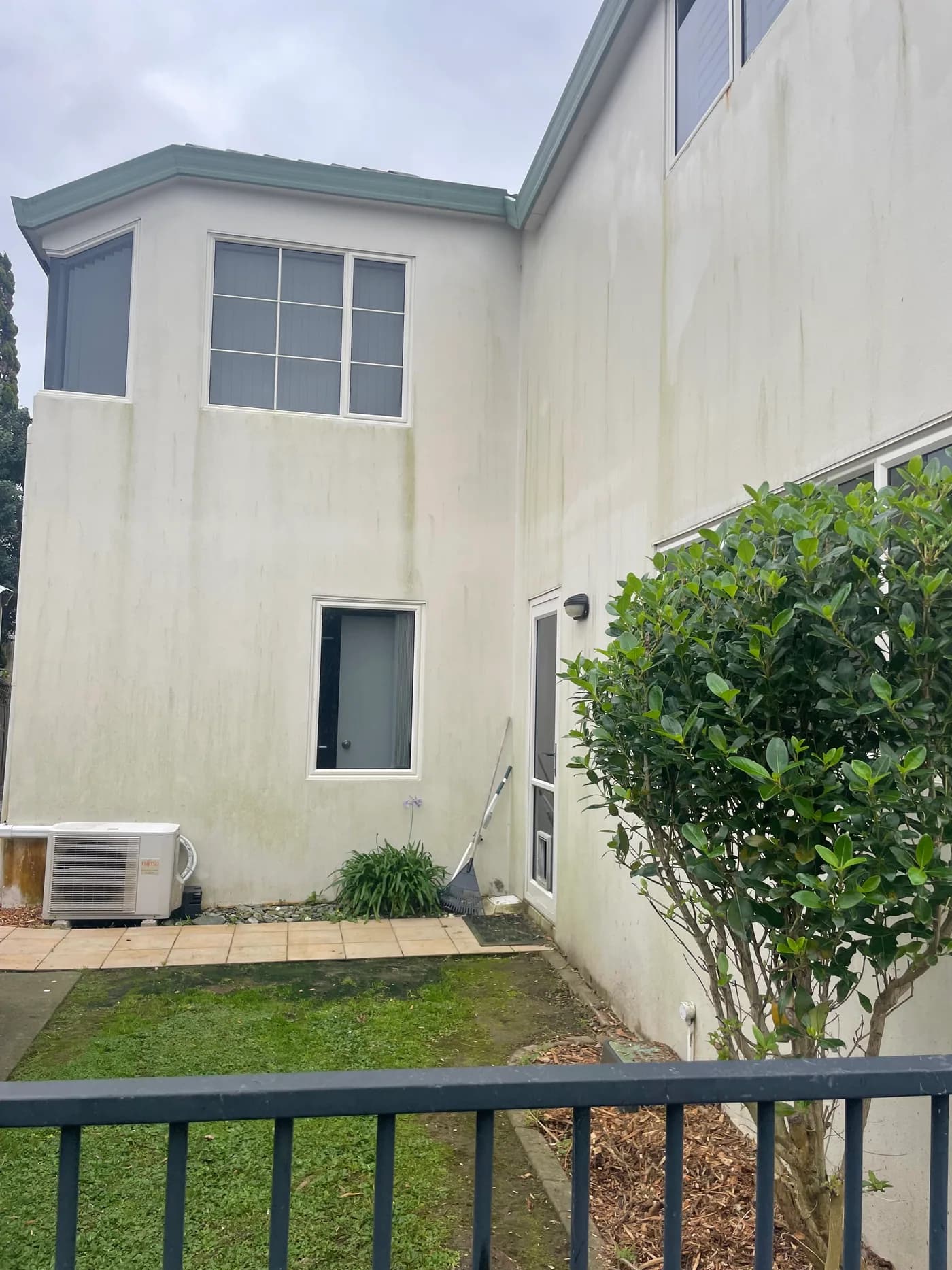 Rear exterior wall before Shoreline house washing